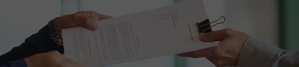 The slitter is slitting the wire cloth into strips.